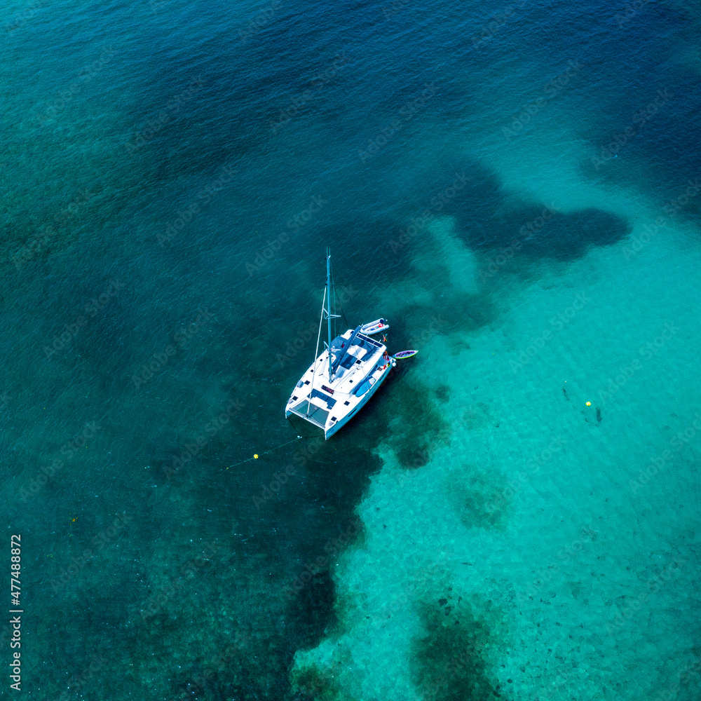 Aerial View of a Catamaran in tropical waters