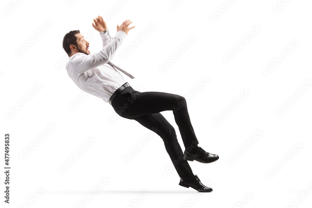 Full length side shot of a man in formal clothes falling Full length side shot of a man in formal clothes falling