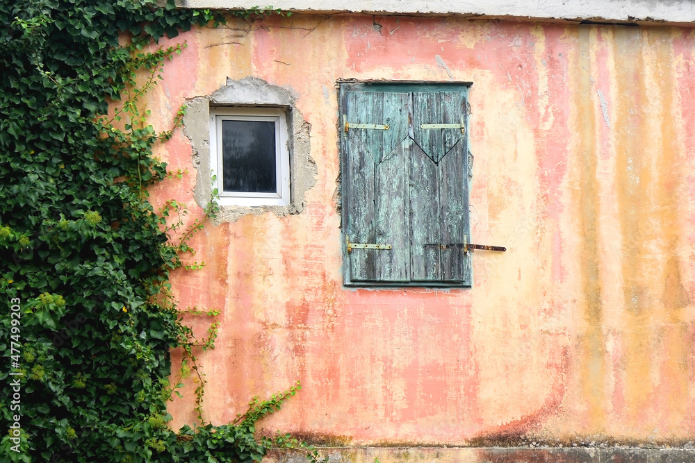 Old rustic window on a Mediterranean house, front view. Old rustic window on a Mediterranean house, front view.