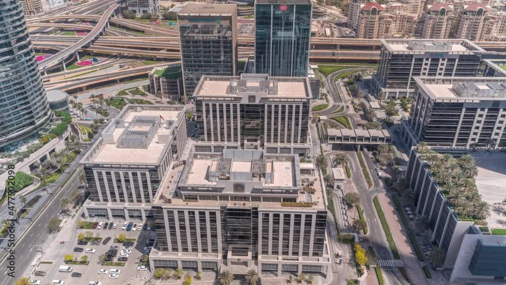 Office buildings in Dubai downtown aerial timelapse. Office buildings in Dubai downtown aerial timelapse.