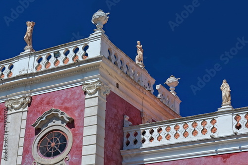 NeoRococo palace-pink façade facing the gardens-porthole window-white balustrade-rooftop statues. Estoi-Algarve-Portugal-017 photo