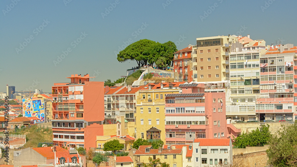 `Mirador` lookout point on a hill over the houses of Lisbon