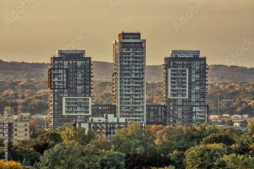 Apartment buildings  in a suburban setting seen at sunset on a warm fall afternoon © Stephen Jackson