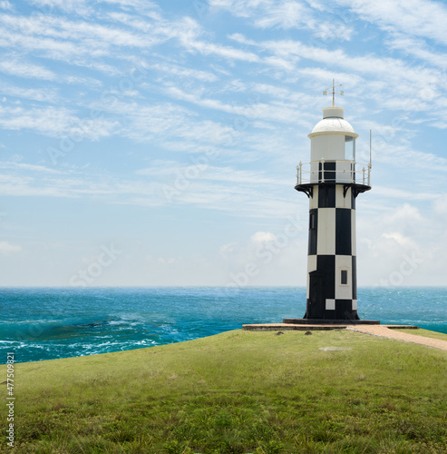 Port Shepstone Lighthouse with turquoise blue indian ocean water