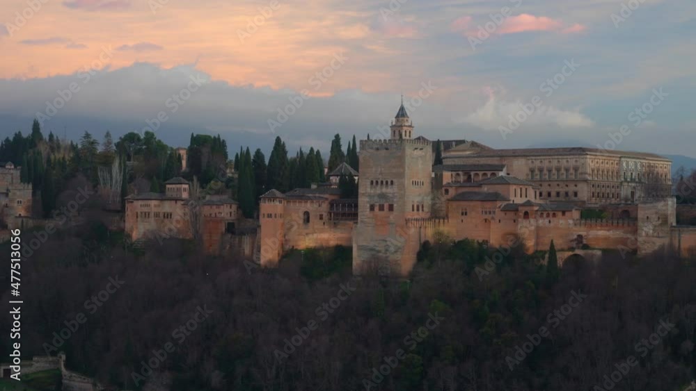 Alhambra palace in Granasa by sunset in winter Alhambra palace in Granasa by sunset in winter