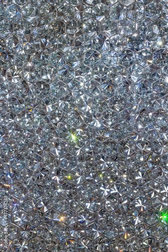 Obraz na plátně Highly detailed surface depicting a background of dazzling diamonds and glittering jewels reflecting light with silver and metallic reflects