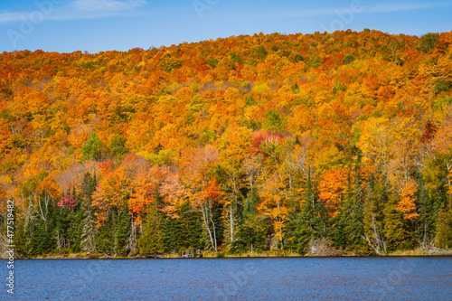 view of Crystal Lake in Vermont autumn landscape 