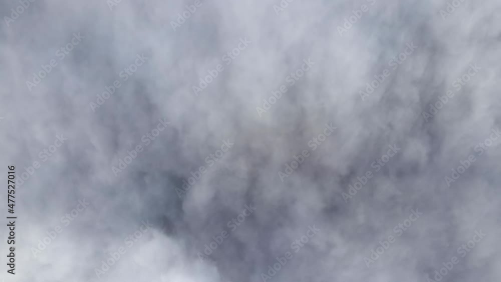 Aerial view from high altitude of earth covered with puffy rainy clouds forming before rainstorm Aerial view from high altitude of earth covered with puffy rainy clouds forming before rainstorm