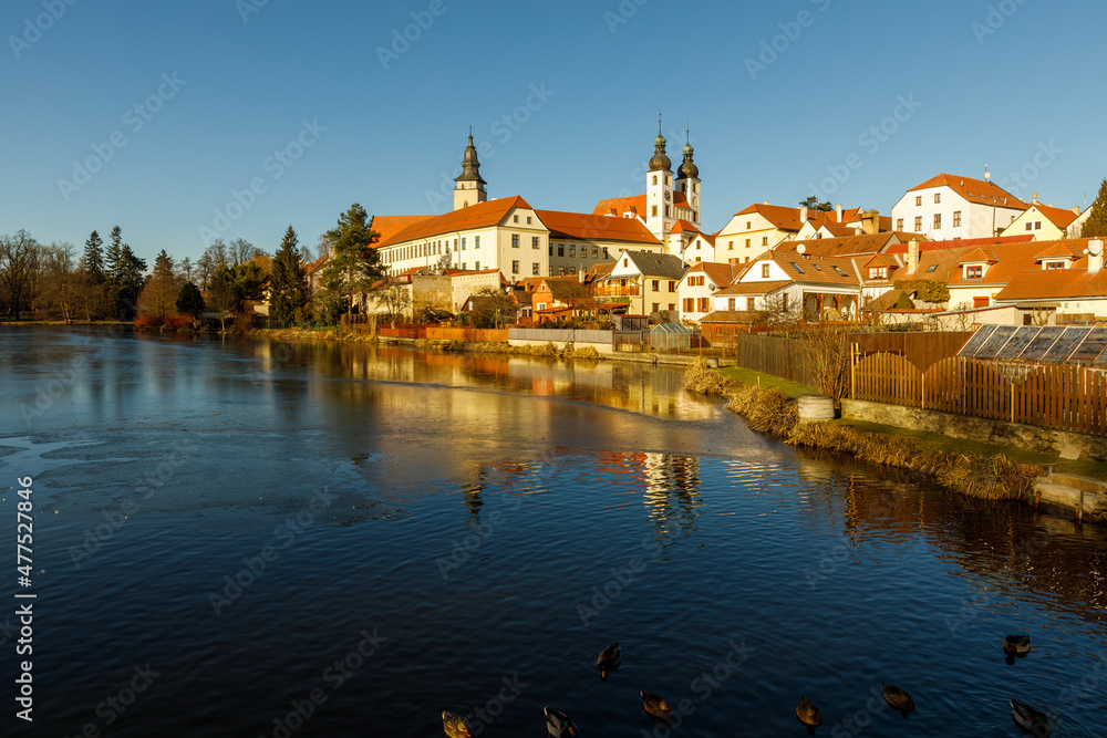 Castle Park and Telc Castle. View of the city of Telc in the winter sunset.
The picturesque castle and the historic center with the decorative facades of the houses belong to the UNESCO World Heritage