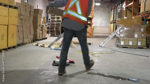 An industrial occupational health and safety topic.  Slips, trips and falls are a major cause of workplace accidents and claims. photo