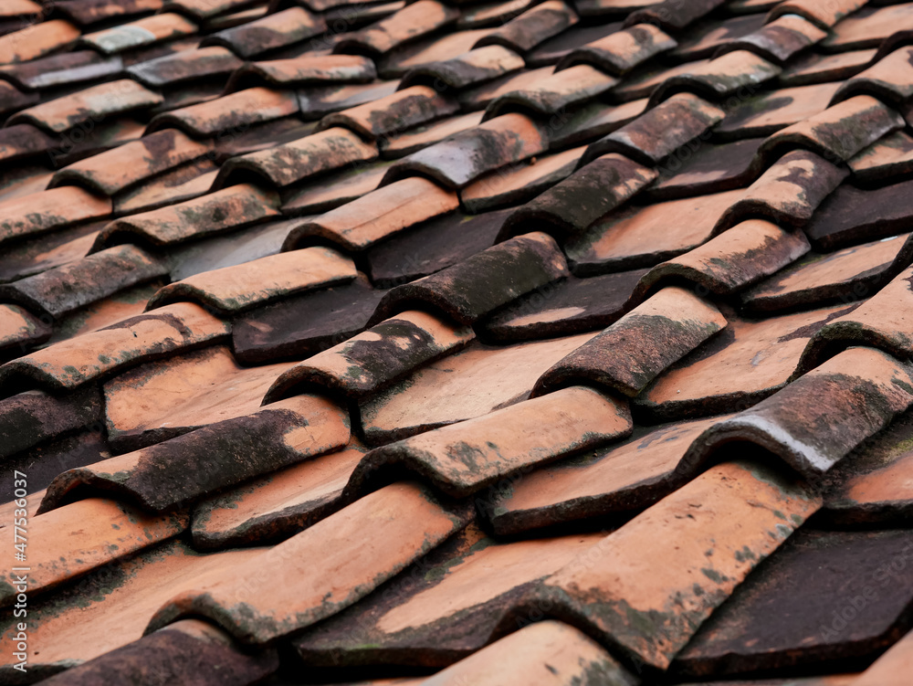 old house roof texture. Stacked traditional roof tiles old house roof texture. Stacked traditional roof tiles