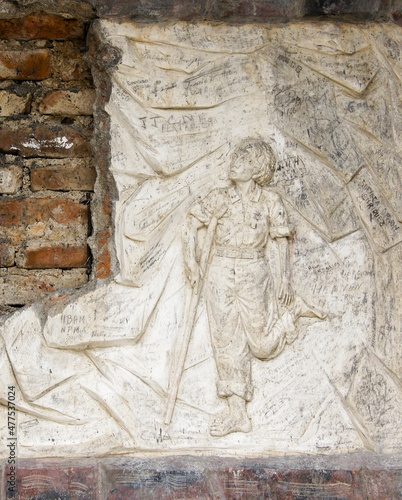 Ipiales, Colombia: A carved-stone plaque of gratitude for the healing of a disabled man at Santuario Nuestra Señora de las Lajas (Las Lajas), a Roman Catholic basilica and pilgrimage site