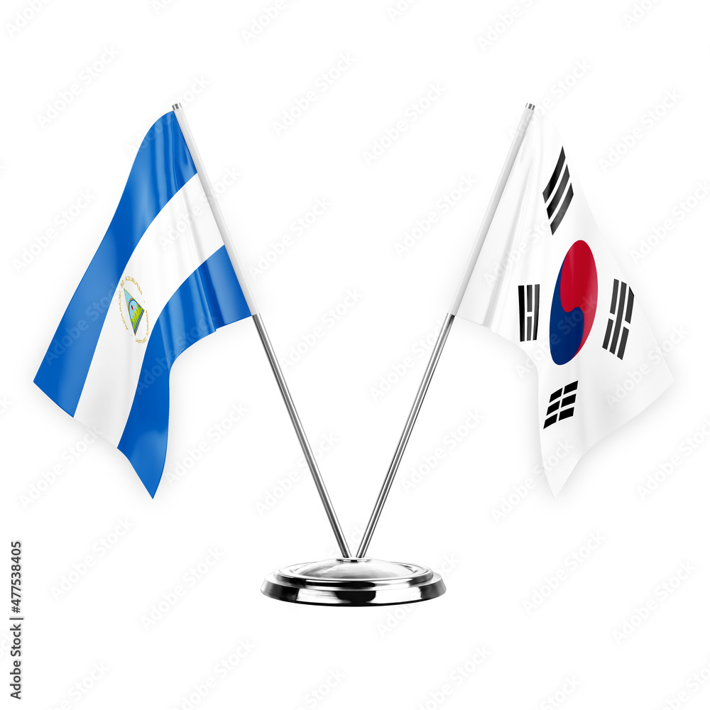Two table flags isolated on white background 3d illustration, nicaragua and south korea