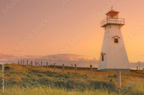 prince edward island canada lighthouse at sunset photo