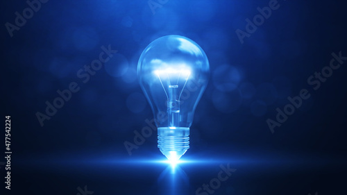 Creativity and new ideas. There is an electric bulb in the middle with bright white light. against a dark blue background.