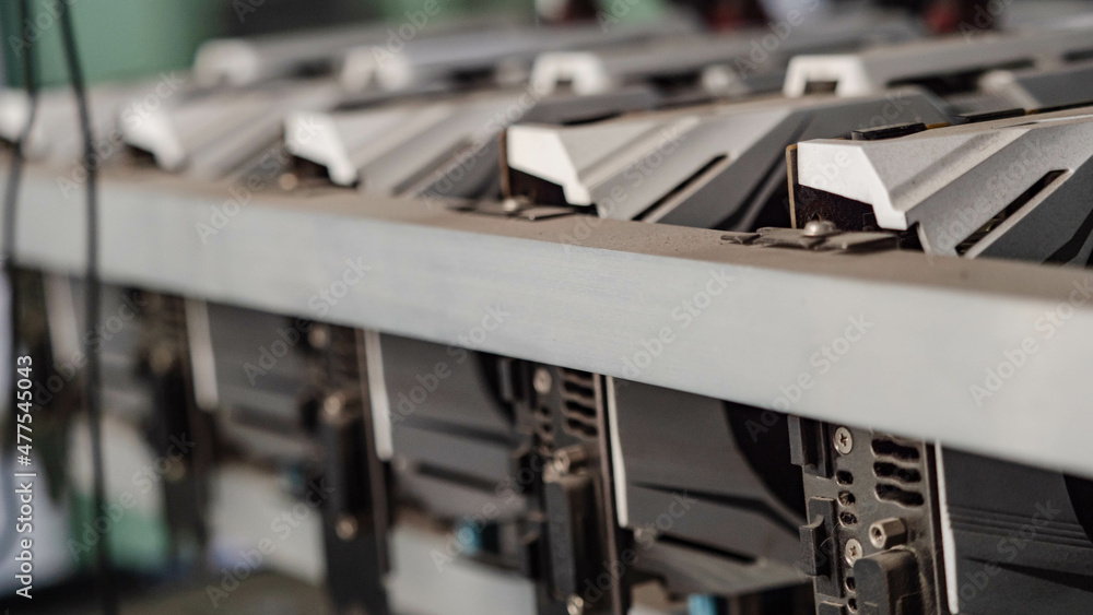 Bitcoin miner Crypto Currency Focus on the video card and accessories, Concept Digital money processing machine. Bitcoin miner Crypto Currency Focus on the video card and accessories, Concept Digital money processing machine.