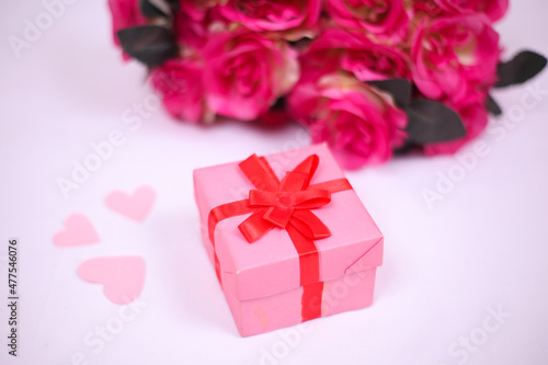 flowers and gift box for valentine's day isolated on white background © HumbaFrame