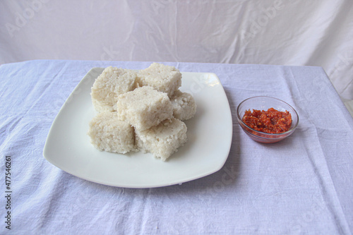 Kiribath and lunu miris plates on the white table