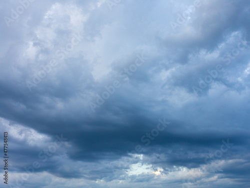 The evening sky, sunlight breaks through clouds and clouds, creating all kinds of forms of air masses. -