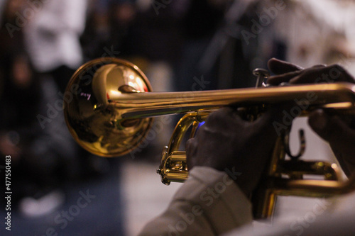 Mariachi musician golden trumpet playing