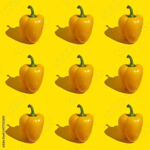 Seamless pattern with bell pepper on yellow background.