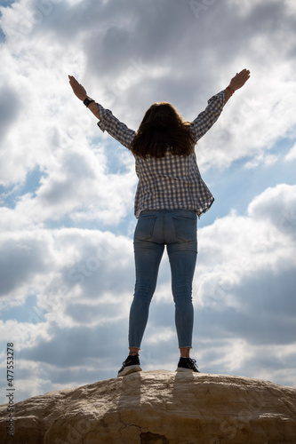 person on the top of a mountain