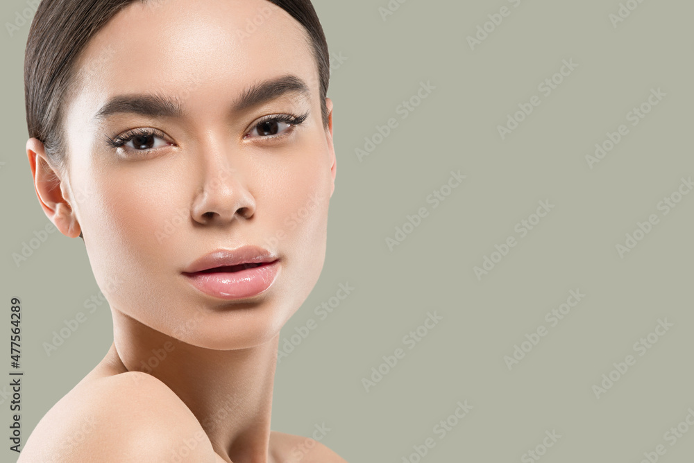 Fototapeta premium Asian woman beauty healthy skin care and beautiful hair female model portrait Color background green