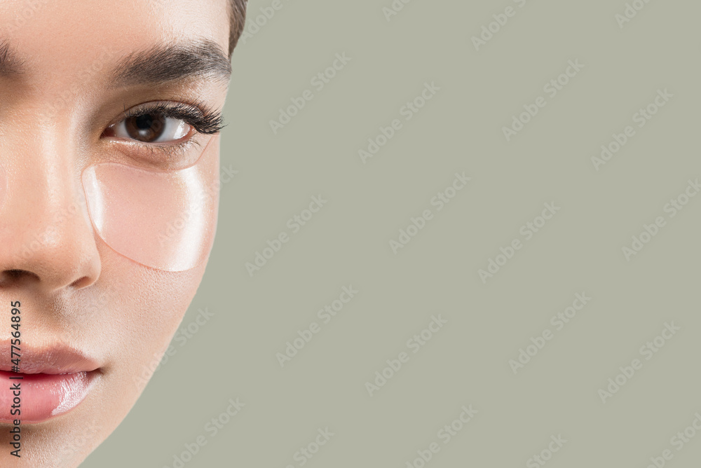Eyes mask asian woman face cosmetic. Color background. Green Eyes mask asian woman face cosmetic. Color background. Green