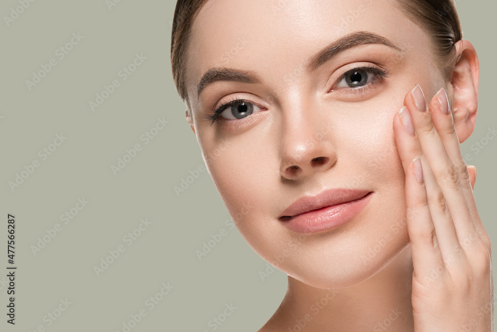 Skin care woman with hands portrait skin closeup cosmetic age concept. Color background green Skin care woman with hands portrait skin closeup cosmetic age concept. Color background green