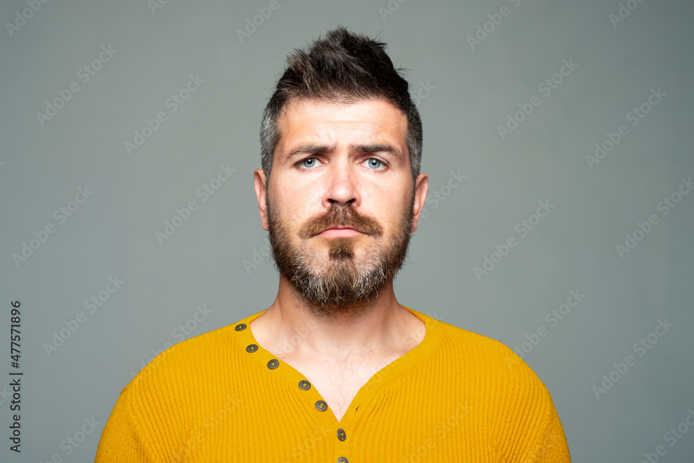 Fototapeta premium Serious bearded man. Sad emotion. People expressions and emotions.
