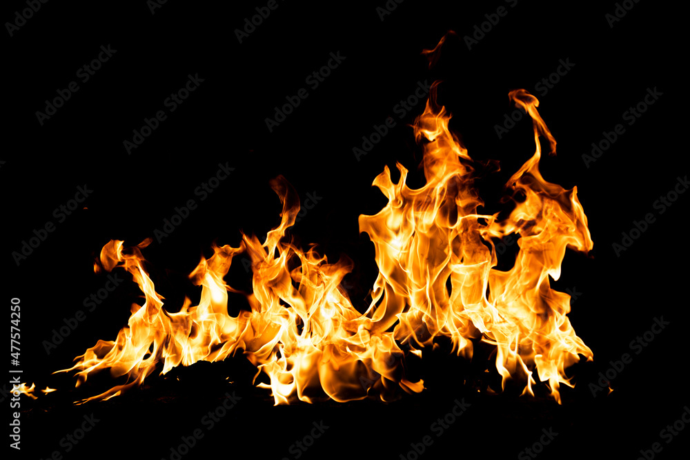 Fire flames isolated on black background. Fire burn flame isolated, flaming burning art design concept with space for text. Fire flames isolated on black background. Fire burn flame isolated, flaming burning art design concept with space for text.