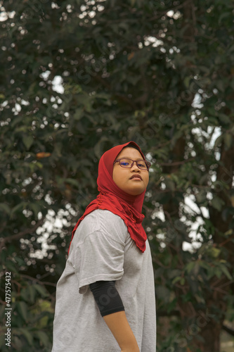 Young hijab Asian girl at the park.