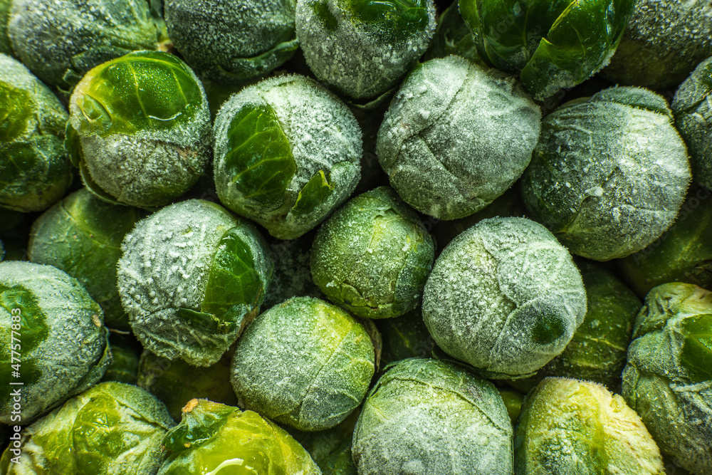 frozen brussels sprouts background closeup frozen brussels sprouts background closeup