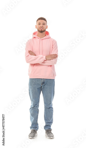 Young guy in stylish hoodie on white background