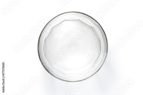 Top view of empty glass jar isolated on white background.