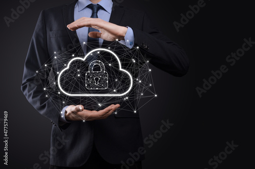 Business man hold,holding cloud computing data and security on global networking,Padlock and cloud icon. Technology of business.Cybersecurity and information or network protection.internet project