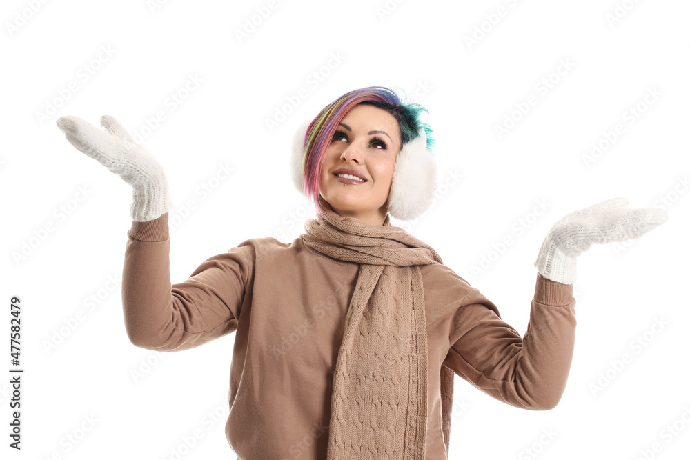 Extravagant woman in winter clothes on white background Extravagant woman in winter clothes on white background