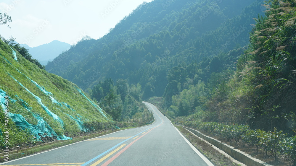 One countryside road across the mountains in the countryside of the China in spring