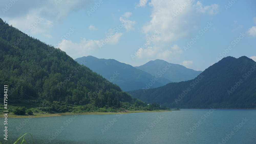The beautiful mountains landscapes with the green forest and little village as background in the countryside of the China