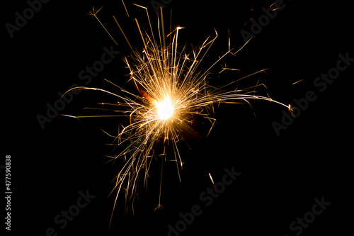 Single sparkler isolated on black background