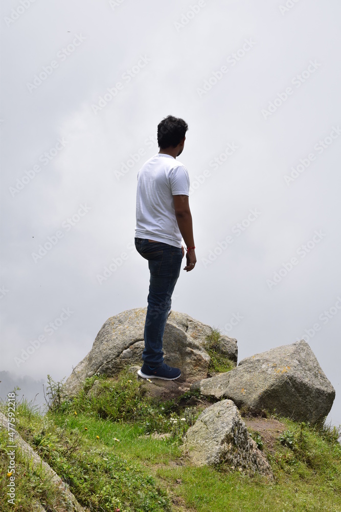 person on top of mountain person on top of mountain