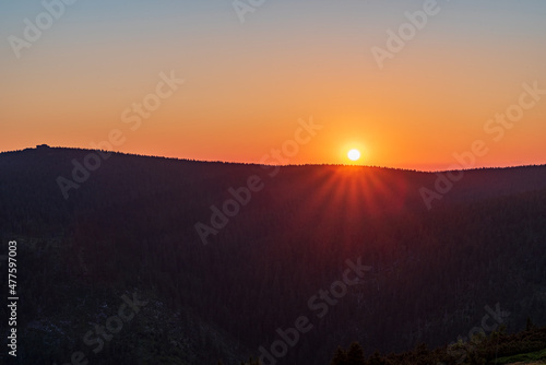 Sunset bellow Vozka hill summit in Jeseniky mountains in Czech republic