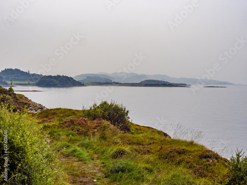 Landscape view of the coastline and hills line, from the Ganavan beach walk, Ganavan, Oban, Scotland, UK
