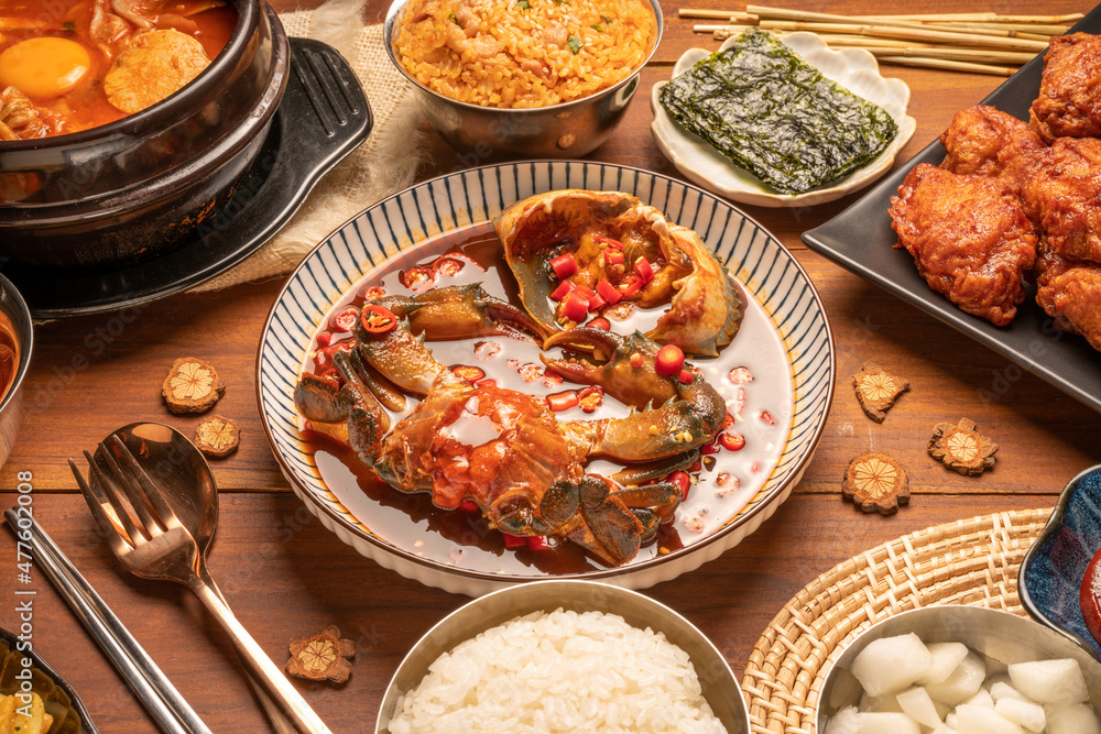 Korean Soy Sauce Pickled Crab, Fresh raw crabs marinated in a mild soy sauce, Ganjang Gejang Korean traditional food.
Korean Soy Sauce Pickled Crab, Fresh raw crabs marinated in a mild soy sauce, Ganjang Gejang Korean traditional food.