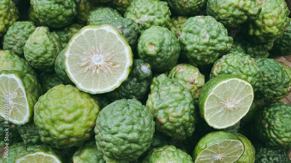 Slice bergamot fruit or kaffir lime, herbal and food ingredient in Thai food Slice bergamot fruit or kaffir lime, herbal and food ingredient in Thai food