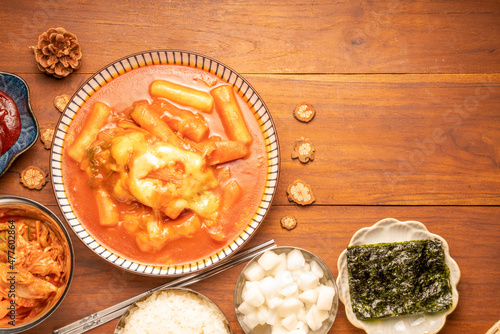 Spicy Rice Cake with Cheese or Teokbokki with spicy sauce Korean traditional food, Tteokbokki is Korean rice cake stick in spicy sauce Korean cuisine dish.