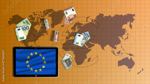European economic banner with mobile tablet and flag. Scattered bent and twisted EU paper money, 5, 10, 20 and 100 euro banknotes on the background of the world map. View from above