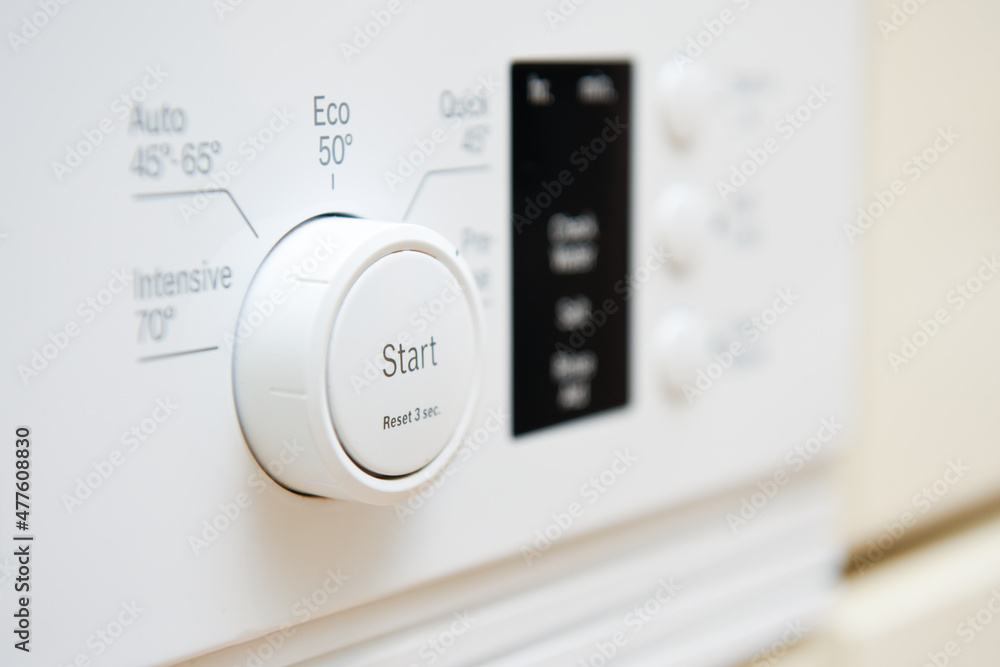 Dishwasher control dial on kitchen white goods Dishwasher control dial on kitchen white goods