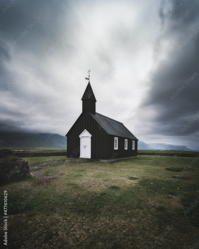 Moody, dramatic view of famous Black Church (Búðakirkja), Búðir on Snæfellsnes peninsula, Western Iceland