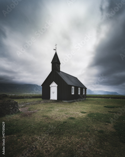 Moody, dramatic view of famous Black Church (Búðakirkja), Búðir on Snæfellsnes peninsula, Western Iceland